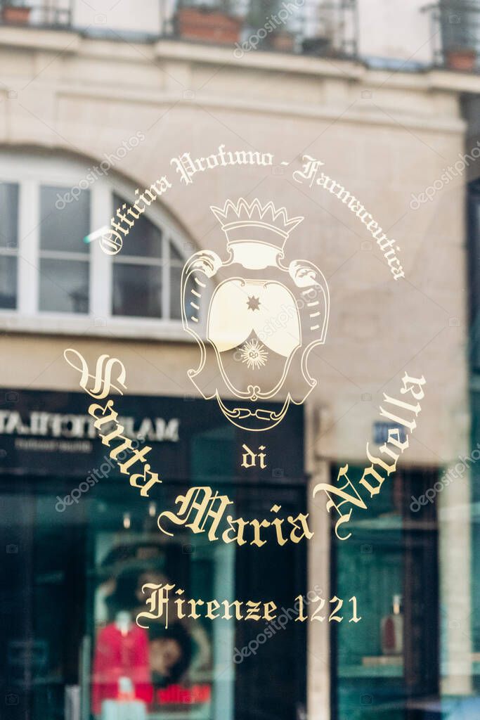 Paris, France - 23.02.25: Santa Maria Novella boutique sign with gold crest and lettering on rue Saint-Honore