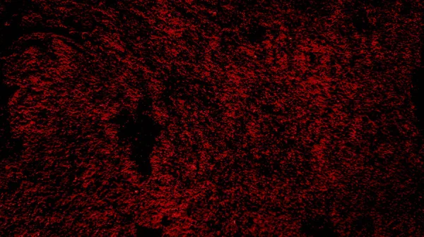 Beton duvarın yüzey dokusu ürkütücü koyu kırmızı kan rengi. Cadılar Bayramı kullanımı için arkaplan