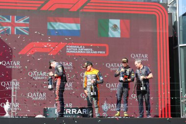 Lando Norris (GBR) McLaren MCL60 Max Verstappen (NED) Redbull Racing RB19 Sergio Perez (MEX) Redbull Racing RB19