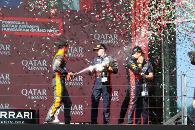 Lando Norris (GBR) McLaren MCL60 Max Verstappen (NED) Redbull Racing RB19 Sergio Perez (MEX) Redbull Racing RB19