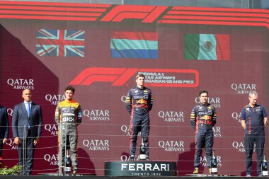 Lando Norris (GBR) McLaren MCL60 Max Verstappen (NED) Redbull Racing RB19 Sergio Perez (MEX) Redbull Racing RB19