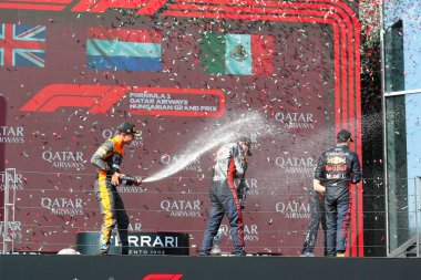 Lando Norris (GBR) McLaren MCL60 Max Verstappen (NED) Redbull Racing RB19 Sergio Perez (MEX) Redbull Racing RB19