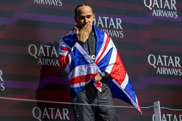 stock image  Lewis Hamilton (GBR) - Mercedes-AMG PETRONAS F1 Team - Mercedes W15 - Mercedes E Performance on the podium after winning the Race on day 4, Sunday july 7, 2024 of the formula 1 qatar airways british grand prix 2024, scheduled to take place at the si