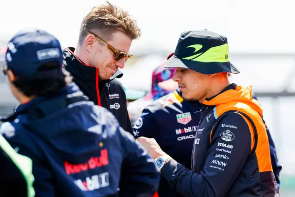 stock image  Nico Hulkenberg (GER) - MoneyGram Haas F1 Team - Haas VF-24 - Ferrari andLando Norris (GBR) - McLaren Formula 1 Team - McLaren MCL38 - Mercedes during Race Day, on day 4, sunday july 7, 2024 of the formula 1 qatar airways british grand prix 2024, sc