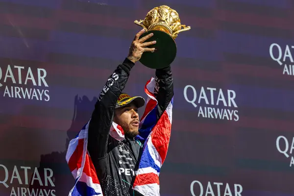 stock image  Lewis Hamilton (GBR) - Mercedes-AMG PETRONAS F1 Team - Mercedes W15 - Mercedes E Performance on the podium after winning the Race on day 4, Sunday july 7, 2024 of the formula 1 qatar airways british grand prix 2024, scheduled to take place at the si