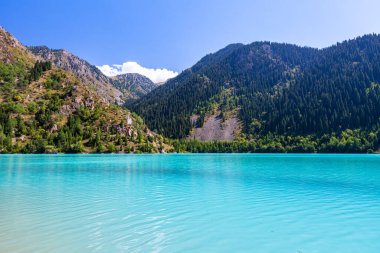 Unusually beautiful blue lake Issyk in the mountains of Kazakhstan. Near from Almaty