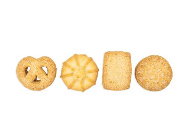 Beyaz arkaplanda izole edilmiş farklı şekillerde farklı çerezler.