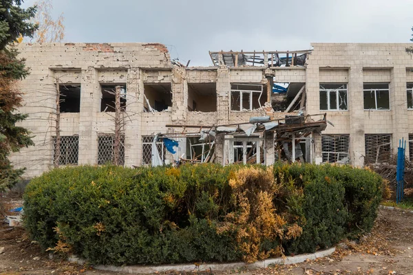 stock image War in Ukraine. 2022 Russian invasion of Ukraine. Administrative building damaged by shelling. Destruction of infrastructure. Terror of the civilian population. War crimes