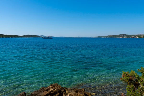 stock image Croatia. Summer. Sunny day. Rocky shore of the Adriatic Sea. Tourist season. Popular holiday destination