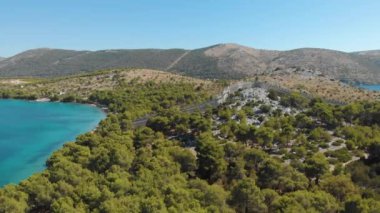 Croatia. Coast of the Adriatic Sea. Ruins of an ancient fortress. Summer. Tourist season. Popular place to relaxation. Drone. Aerial view. The camera moves forward