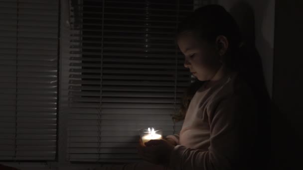 Girl Dark Room Window Holds Candle Glass Her Hands Fixed — Video