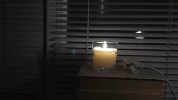 Disconnected Electrical Plug Dark Empty Room Window Light Candle Close — Video Stock