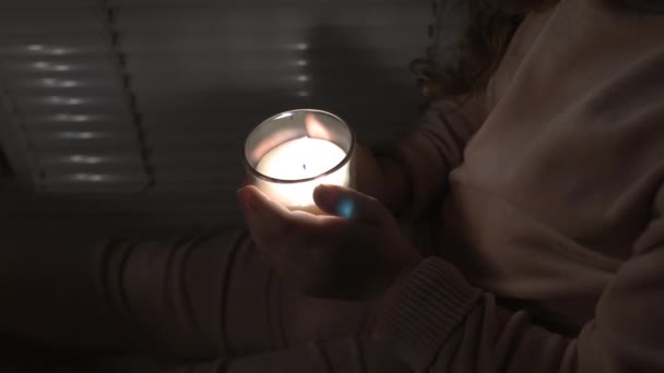 Girl Dark Room Window Holds Candle Glass Her Hands Close — Wideo stockowe
