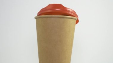 Rotating paper coffee cup with lid ajar isolated on gray background. Close-up (side view). Loop rotation