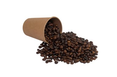 Overturned disposable paper cup filled with roasted coffee beans isolated on white background (close-up)