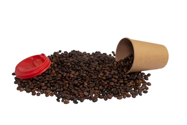 Tilted disposable paper cup with lid filled with roasted coffee beans isolated on white background (close-up)