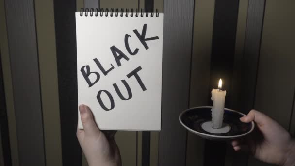Notepad Inscription Blackout One Hand Burning Candle Other Hand Close — Video