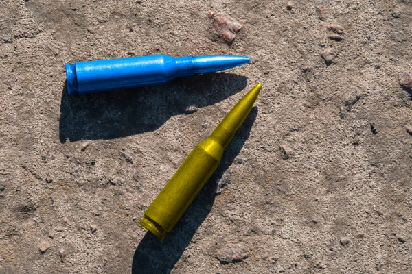 Yellow Blue Rifle Cartridges National Symbol Ukraine Lie Concrete Surface — Stock Photo, Image