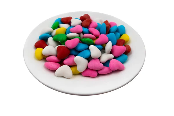 Assiette Blanche Avec Des Bonbons Multicolores Forme Cœur Gros Plan — Photo