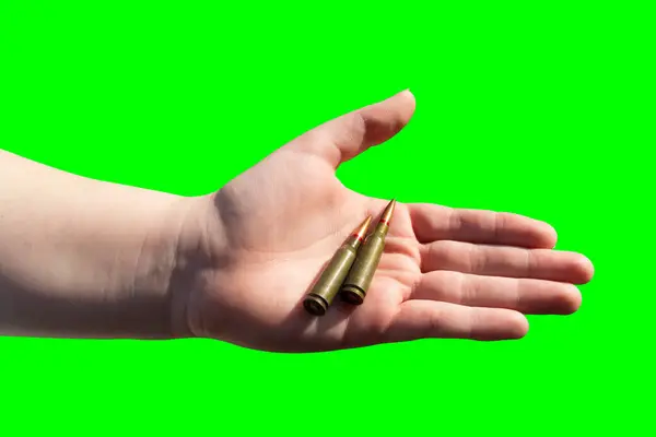 Two Rifle Cartridges Hand Green Background Chroma Key Military Support — Stock Photo, Image