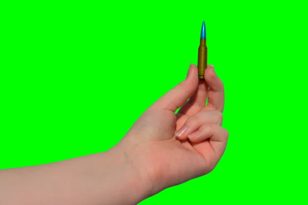 Cartucho Espingarda Amarelo Azul Mão Sobre Fundo Verde Chave Chroma — Fotografia de Stock