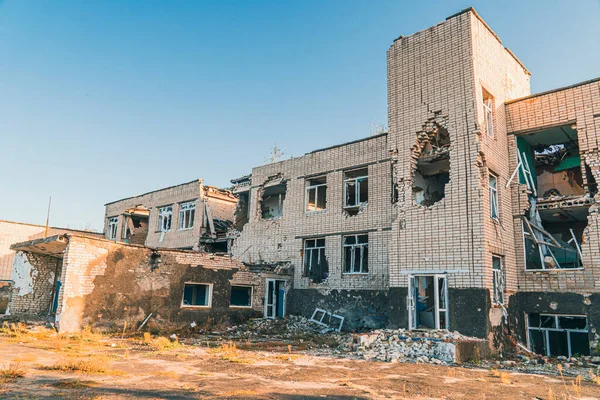 The school was damaged by shelling. War in Ukraine. Russian invasion of Ukraine. Destruction of infrastructure. Terror of civilians. War crimes