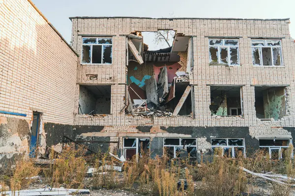 The school was damaged by shelling. War in Ukraine. Russian invasion of Ukraine. Destruction of infrastructure. Terror of civilians. War crimes
