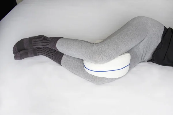 Young Woman Pajama Pants Anatomical Pillow Her Legs Knees Lying —  Fotos de Stock