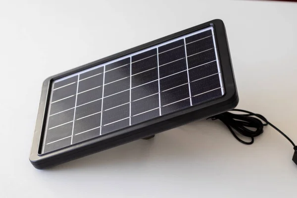 stock image Small solar panel on a white background. Sustainability, caring for the environment