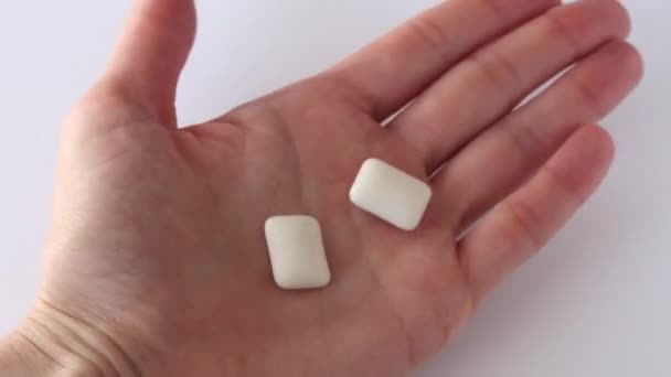 Woman Opens Her Palm Two Chewing Gums Girl Gives Him — Stock Video
