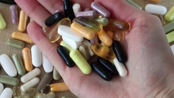 Curing Diseases Pills Supplements Lots Colorful Pills Womans Hand Concept — Video Stock
