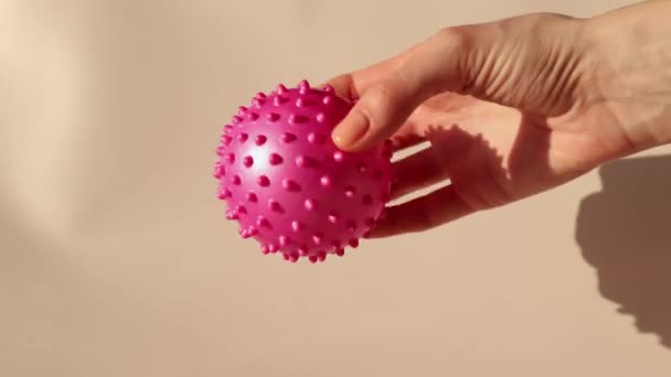 Woman Holding Pink Spiked Ball Massage Ball Can Help You — Stock Video
