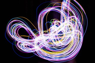 Abstract background Vivid. Iridescent sparkling glow. Led neon purple pink gold glowing. Abstract festive moving background for holiday.