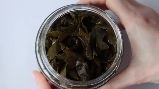 Pickled Grape Leaves Twisted Rolls Glass Jar Top View — 图库视频影像