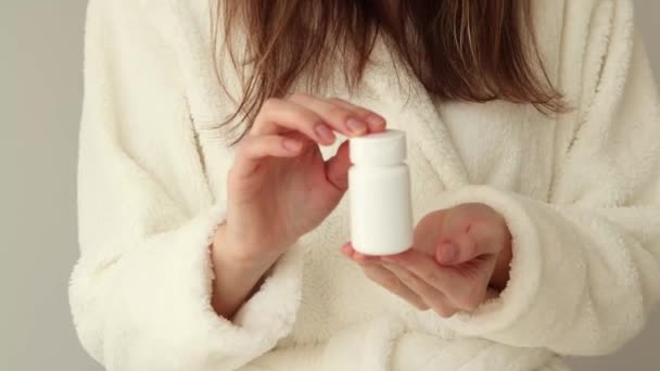 Woman Holding Small White Jar Pills Tablets Inscription — Vídeo de Stock