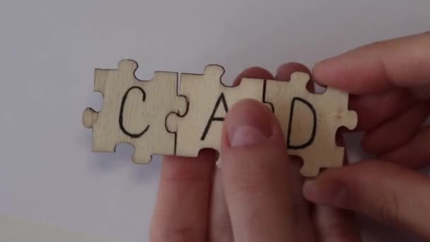 Cad Woord Geschreven Houten Puzzels Witte Achtergrond Cad Acroniem Coronaire — Stockvideo