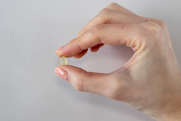 Vitamin Capsule Womans Hand Close Fish Oil Pill Vitamin Supplement — Foto de Stock