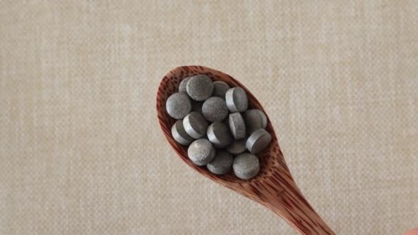 Brown Tablets Spots Beige Background Wooden Spoon Iron Supplements Health — Vídeos de Stock