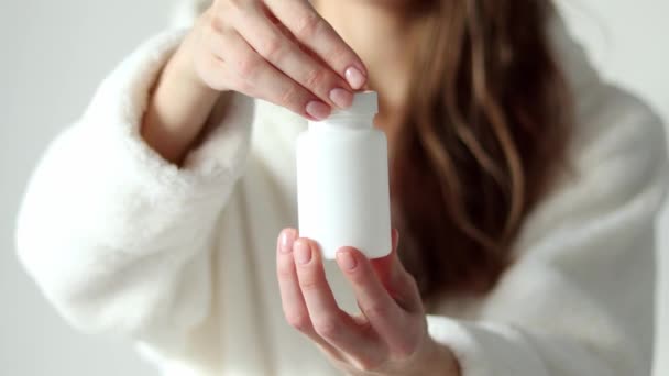 Woman Unscrews Lid White Jar Supplements Vitamins Pills Health Care — ストック動画