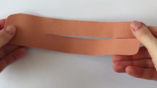 Power Kinesio Tape Pain Relief Improved Mobility Штикер Готовий Покласти — стокове відео