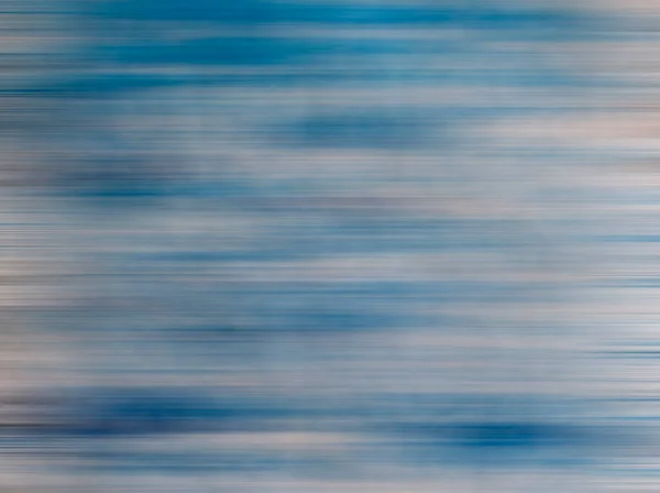 米色和蓝色的背景在运动 有模糊的细线 — 图库照片