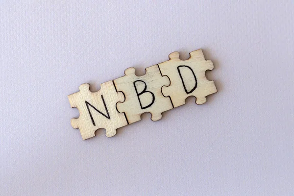 Nbd の頭字語は Big Deal パズルに書かれた手紙 — ストック写真