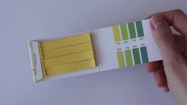 Test Strips Measure White Background Womans Hand — Stock Video