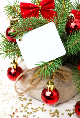 New Year, decorations, decorations for the holiday. Christmas tree branches, balls, bows and lollipop. place for congratulations.