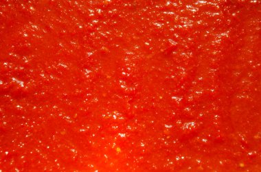 Adjika sosu. Arka plan olarak lezzetli adjika sosu dokusu, yakın plan..