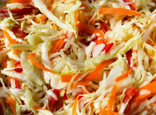 Chopped vegetables. Finely chopped cabbage, carrots and peppers.