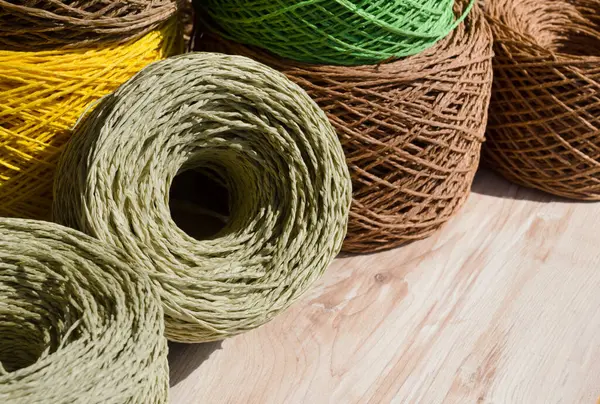 stock image Raffia balls close-up. Skeins of multi-colored raffia are ready for knitting. Eco material for handmade work.