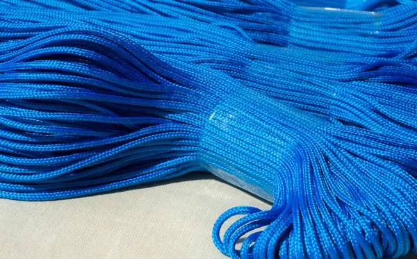 stock image Blue polyester cord in skeins. Synthetic cord for knitting bags and baskets.