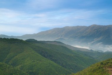 Natural background of the mountain views with blue sky in the winter of Nan province, The north of Thailand.