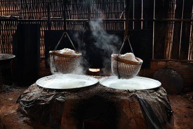 Close-up of ancient salting. The ancient method of boiling salt in a room made of bamboo, The way of life of people in rural villages in Nan province, The north of Thailand. 
